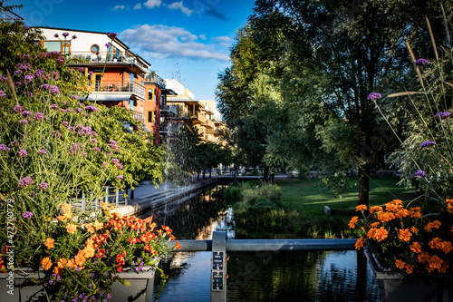 Lovely Park with Flowers and a Fountain Decorates the Södra Hammarbyhamnen Neighborhood of Stockholm, Sweden