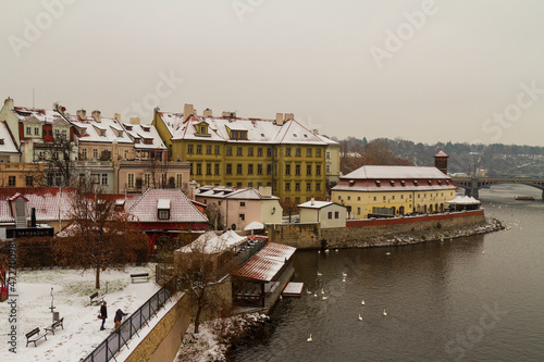 Winter in Prague houses on the river