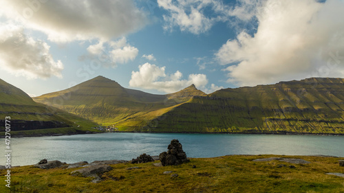 Europe, Faroe Islands. View of the fjord at Funningsfjordur and the village of Funningur near Elduvik on the island of Eysturoy