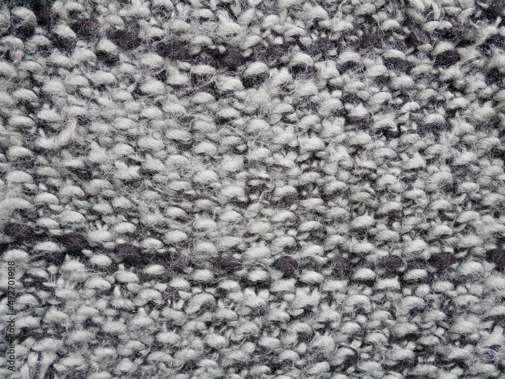 Texture of black white fabric, close up of wool structure, wallpaper background.