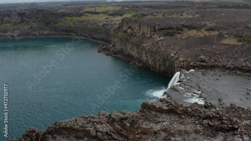 Aerial view Icelandic landscape of the Aldeyjarfoss waterfall in north Iceland. Drone view of waterfall situated in the northern part of the Sprengisandur Road in icelandic highlands photo