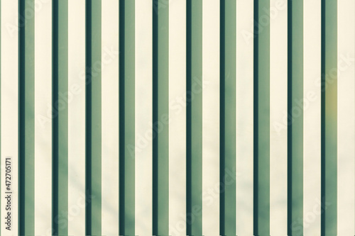 streams on a surface. A background with strips from  color. vertical streams. Background abstract structure. strip  bar  ribbon  stripe texture