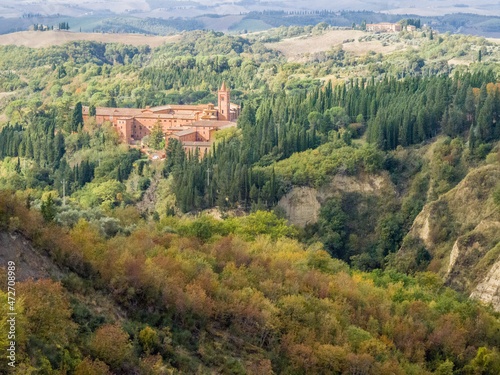 Italy, Tuscany. The abbey of Monte Oliveto Maggiore, a large Benedictine monastery located in Tuscany.