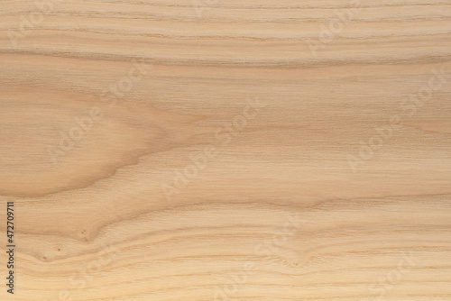 Woody texture of natural walnut veneer  background.