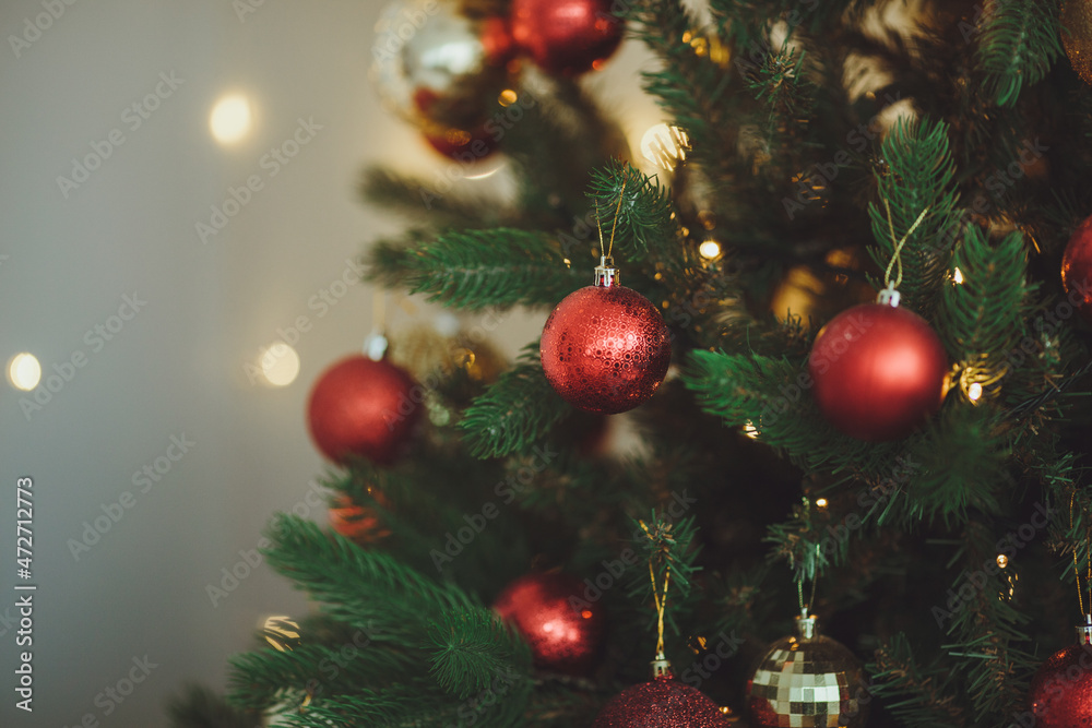 Christmas background. Christmas tree with toys and garlands.
