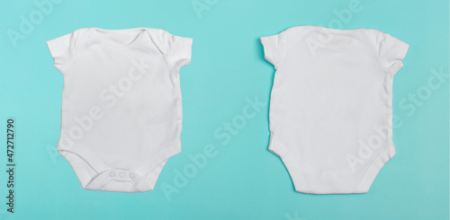 Baby body mockup  white on a colored background. Close up.