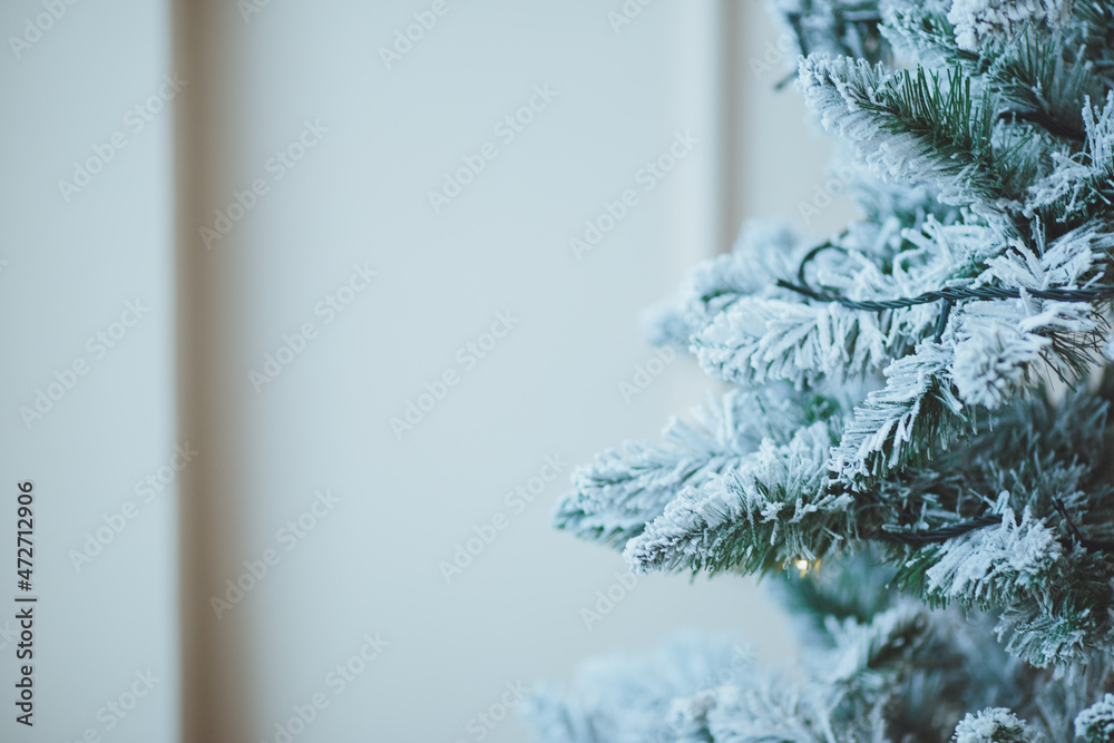Christmas background. Christmas tree with toys and garlands.