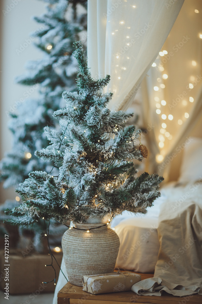Christmas background. Christmas tree with toys and garlands.