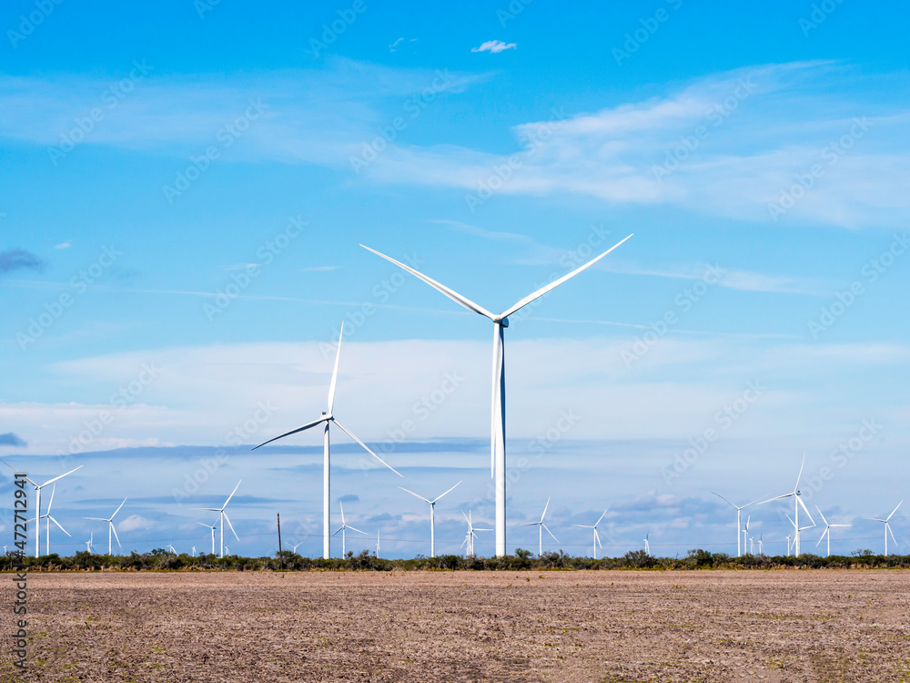 Modern Wind mills in open field