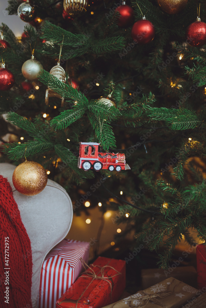 Christmas background. Christmas tree with toys and garlands.