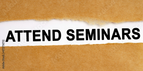 There is a space in the middle of the craft paper, where on a white background the inscription - Attend Seminars