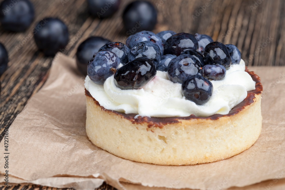 tartlet with chocolate and buttercream with blueberries tartlet with chocolate and buttercream with blueberries