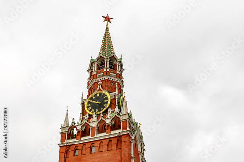 Kremlin tower on rainy clouds background. photo