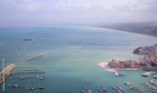 "Castellammare del Golfo", a picturesque city by the sea, photographed from above, with the harbor and many sailing boats, with the horizon in the background