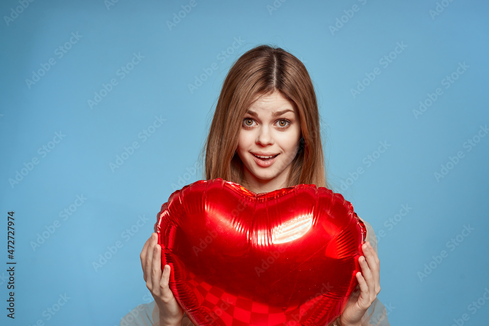 beautiful woman red heart in the hands of the balloon isolated background beautiful woman red heart in the hands of the balloon isolated background