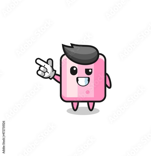 marshmallow mascot pointing top left.