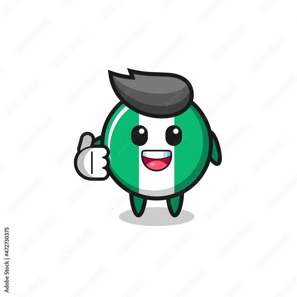 Fototapeta premium nigeria flag mascot doing thumbs up gesture.