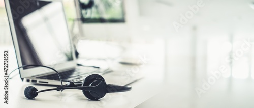 Headset and customer support equipment at call center ready for actively service . Corporate business help desk and telephone assistance concept . photo