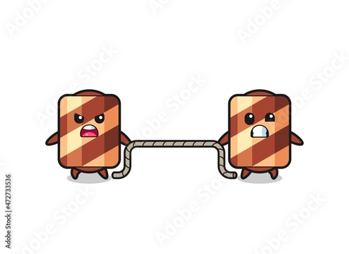cute wafer roll character is playing tug of war game