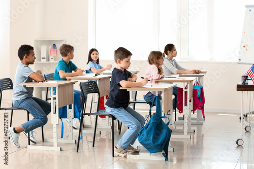 Children taking classes at language school photo