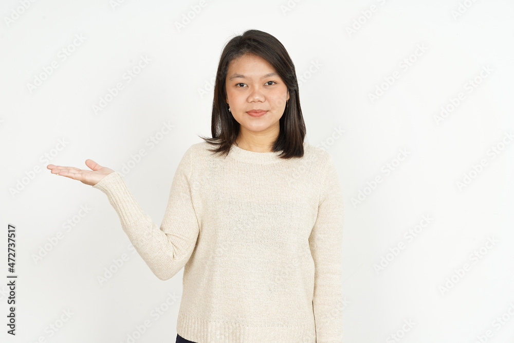 Showing recommended product on open palm of Beautiful Asian Woman Isolated On White Background Showing recommended product on open palm of Beautiful Asian Woman Isolated On White Background