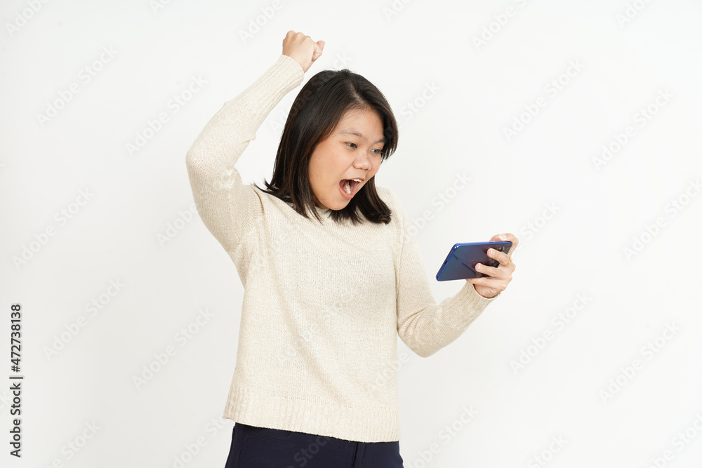 Playing Mobile Game on smartphone of Beautiful Asian Woman Isolated On White Background Playing Mobile Game on smartphone of Beautiful Asian Woman Isolated On White Background