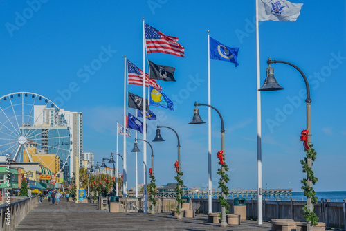 The Boardwalk of Myrtle Beach on the Atlantic Ocean in South Carolina photo