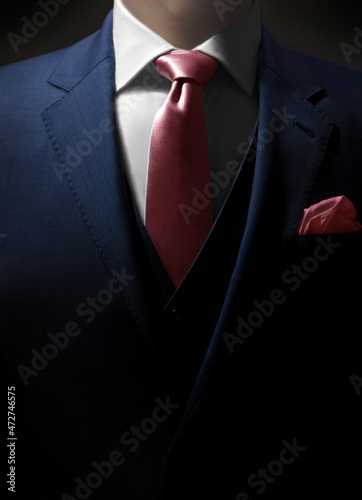 Cuadro en lienzo A dramatic close up shot of a man dressed in an expensive formal suit