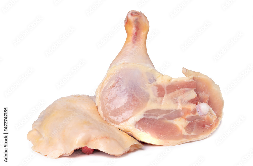 Two chicken legs on a white background, close-up Two chicken legs on a white background, close-up