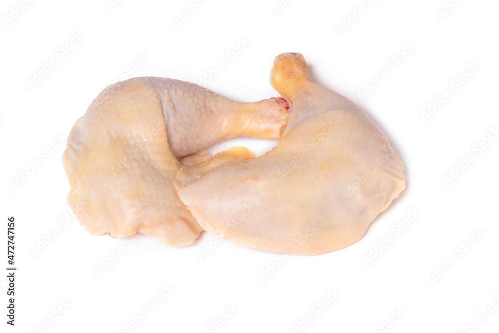 Two chicken legs isolated on a white background, top view Two chicken legs isolated on a white background, top view