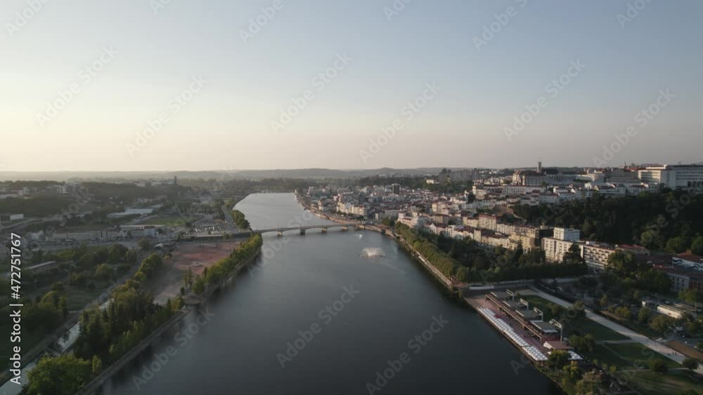 Mondego river and scenic view of Coimbra riverside. Aerial pullback Mondego river and scenic view of Coimbra riverside. Aerial pullback