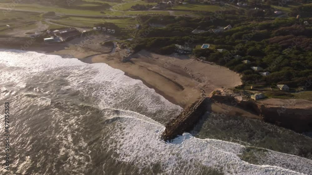 Waves breaking on Luna Roja coast, Chapadmalal in Argentina. Aerial panoramic view Waves breaking on Luna Roja coast, Chapadmalal in Argentina. Aerial panoramic view