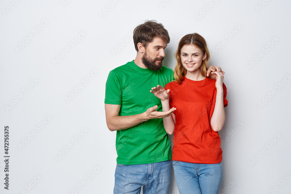 married couple hug friendship colorful t-shirts family studio lifestyle married couple hug friendship colorful t-shirts family studio lifestyle
