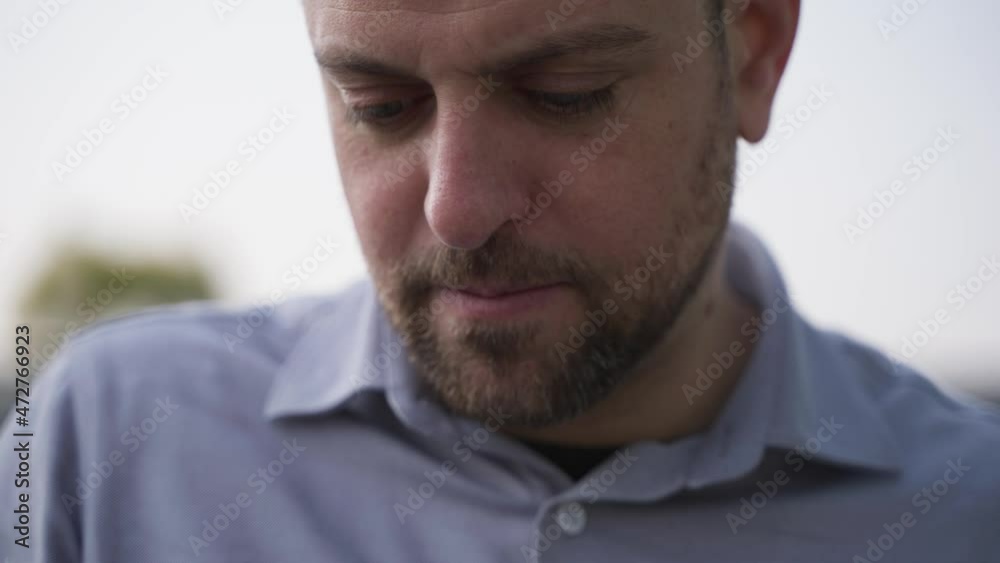 Close up slow motion of white businessman talking on mobile phone seading voice message serious man having conversation on the phone Close up slow motion of white businessman talking on mobile phone seading voice message serious man having conversation on the phone