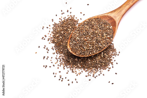 Wooden spoon of organic natural chia seeds close-up isolated