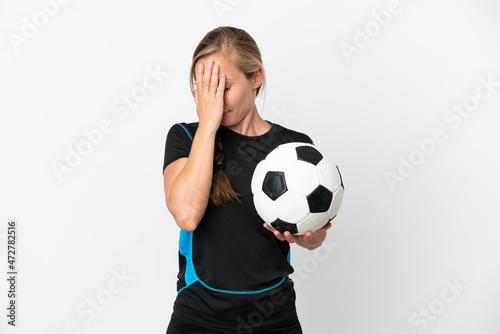 Young football player woman isolated on white background with tired and sick expression © luismolinero