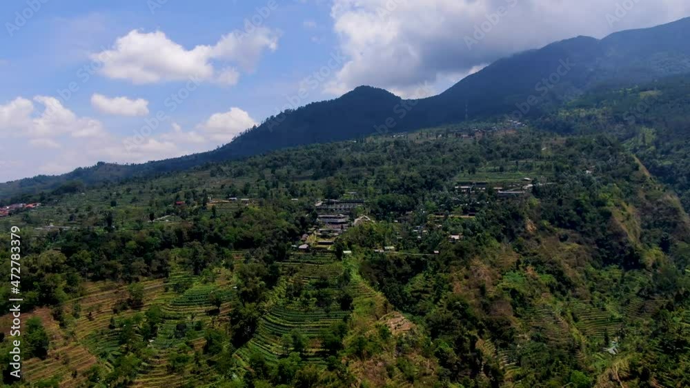 Umbul Sidomukti village in Semarang, Indonesia. Aerial forward Umbul Sidomukti village in Semarang, Indonesia. Aerial forward