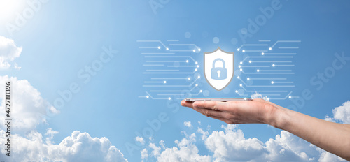 Protection network security computer and safe your data concept, Businessman holding shield protect icon. lock symbol, concept about security, cybersecurity and protection against dangers