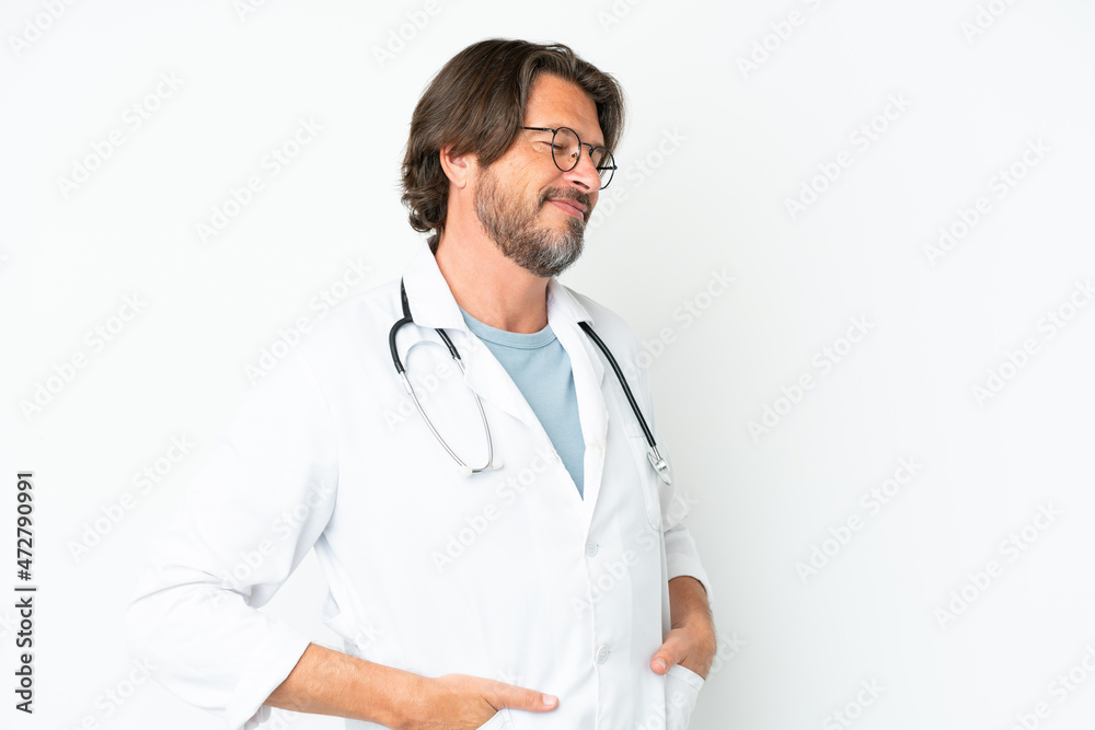 Senior dutch man isolated on white background wearing a doctor gown and with stethoscope Senior dutch man isolated on white background wearing a doctor gown and with stethoscope