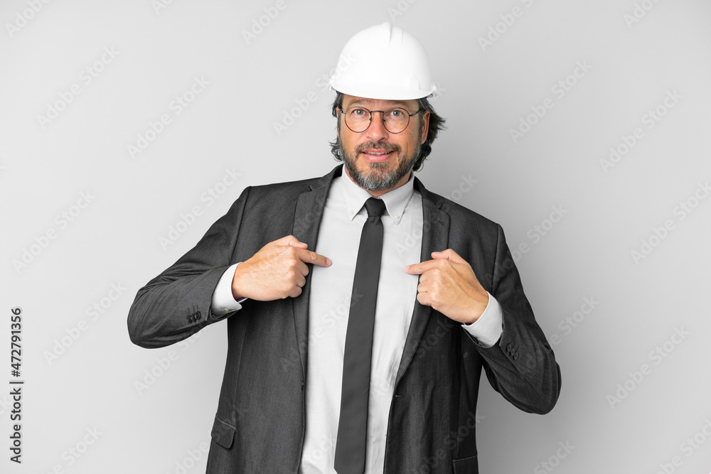 Young architect man with helmet over isolated background with surprise facial expression Young architect man with helmet over isolated background with surprise facial expression