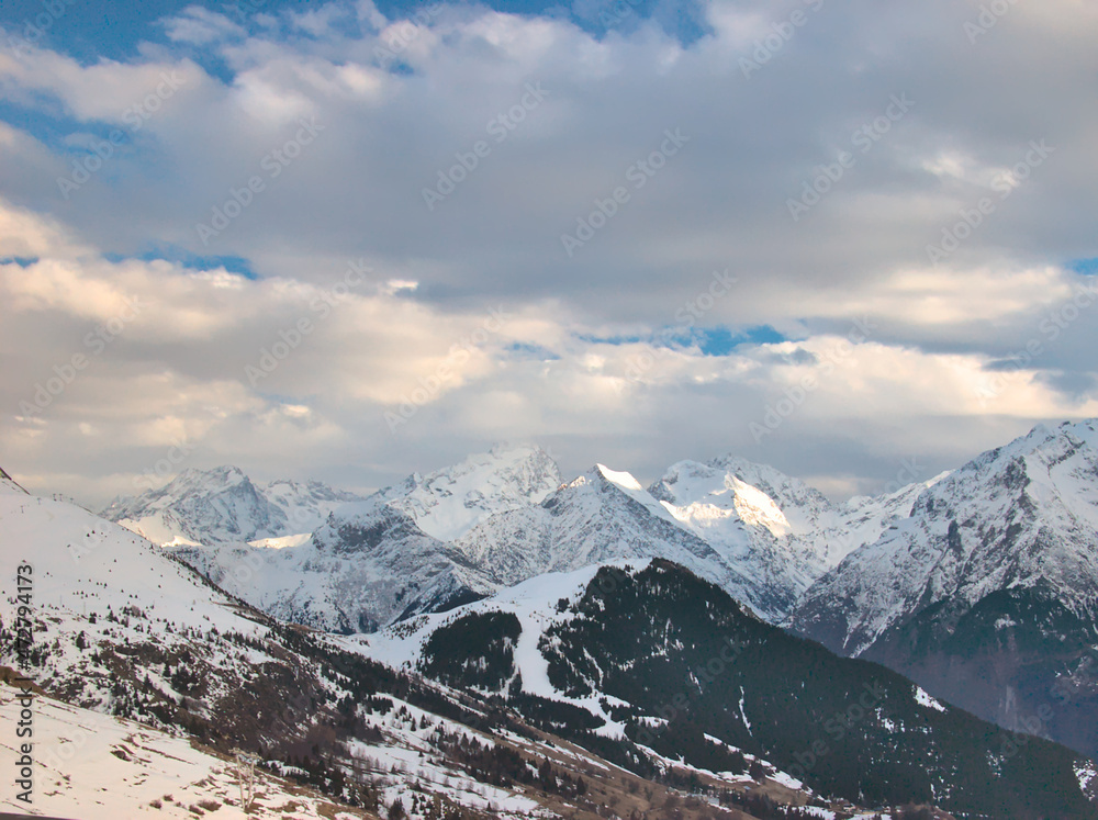 Picturesque clouds over the summits of the French Alps.