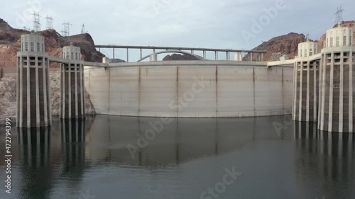 Aerial view reveal of the Hoover Dam face. 