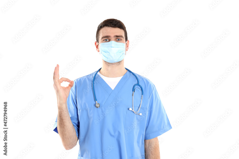 Attractive doctor intern isolated on white background Attractive doctor intern isolated on white background