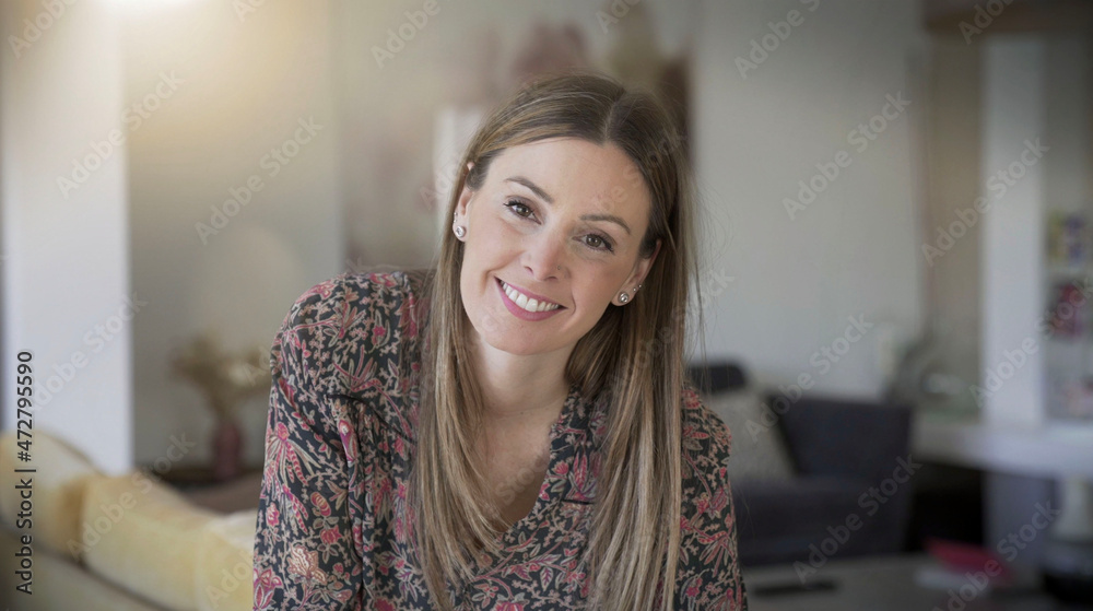 young brunette woman smiling casual in her house young brunette woman smiling casual in her house