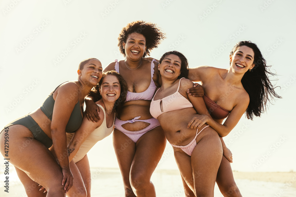 Group of female friends having fun at the beach Group of female friends having fun at the beach