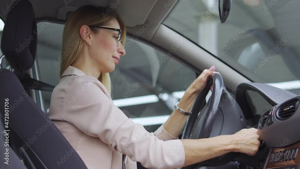 Nervous young lady upset with car breakdown, having problem with starting auto Nervous young lady upset with car breakdown, having problem with starting auto