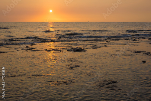 USA, Hawaii, Big Island of Hawaii. Kaloko-Honokohau National Historical Park, Sunset over Honokohau Bay.