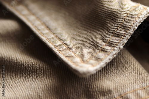Close up of brown denim jacket