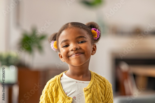 Cute little african american girl looking at camera
