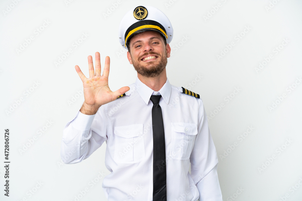 Airplane Brazilian pilot isolated on white background counting five with fingers Airplane Brazilian pilot isolated on white background counting five with fingers